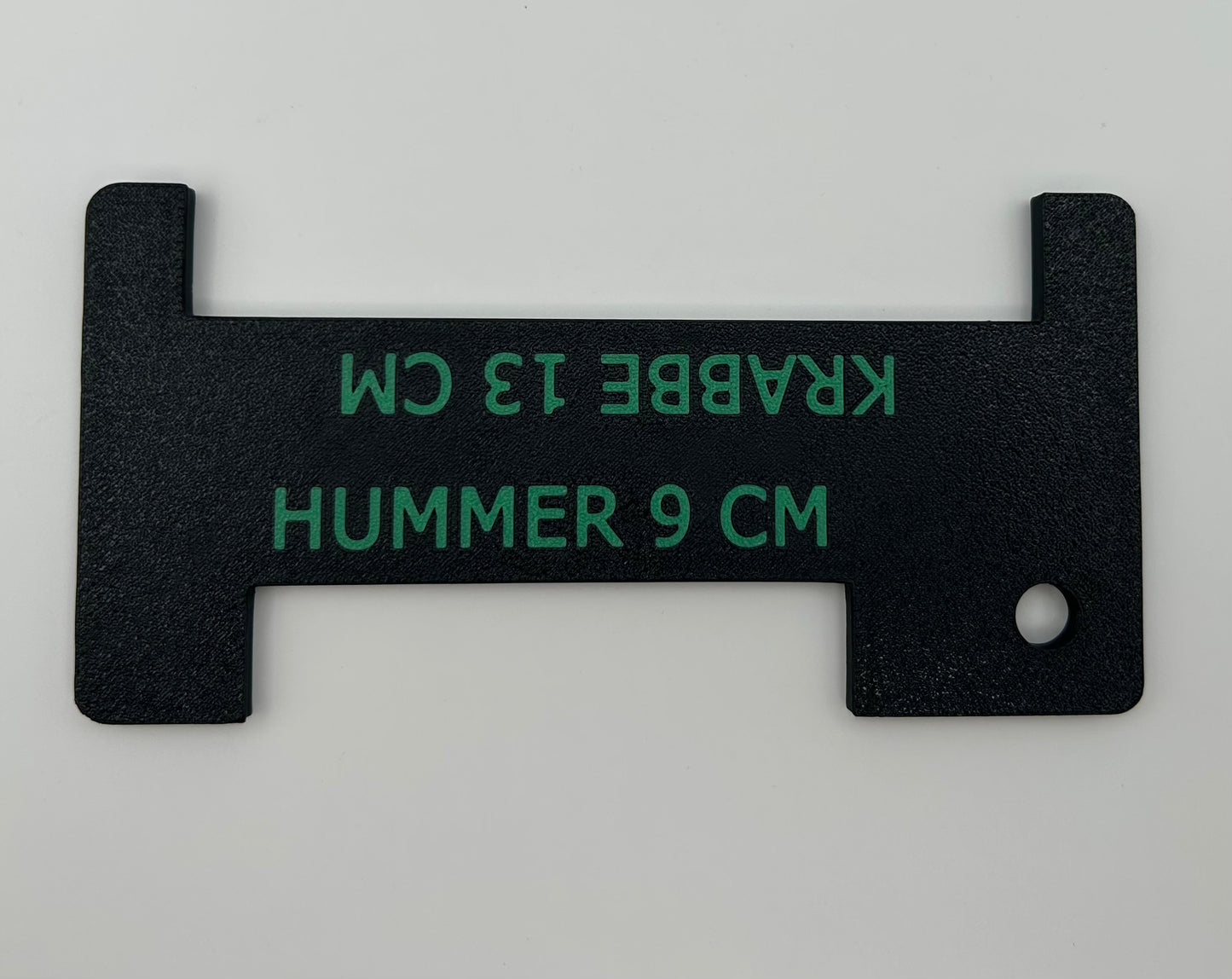 Sort hummer- og krabbemål med grønn tekst
