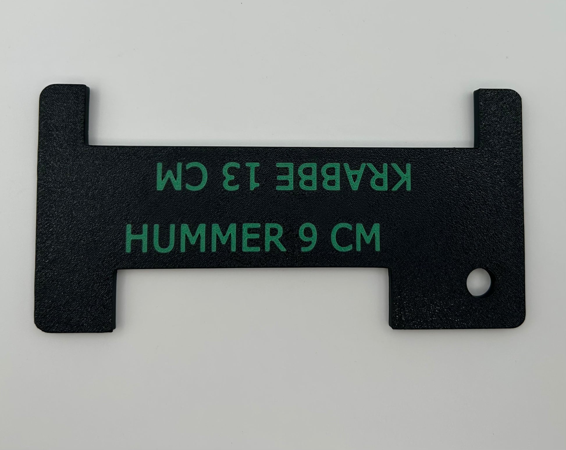 Sort hummer- og krabbemål med grønn tekst